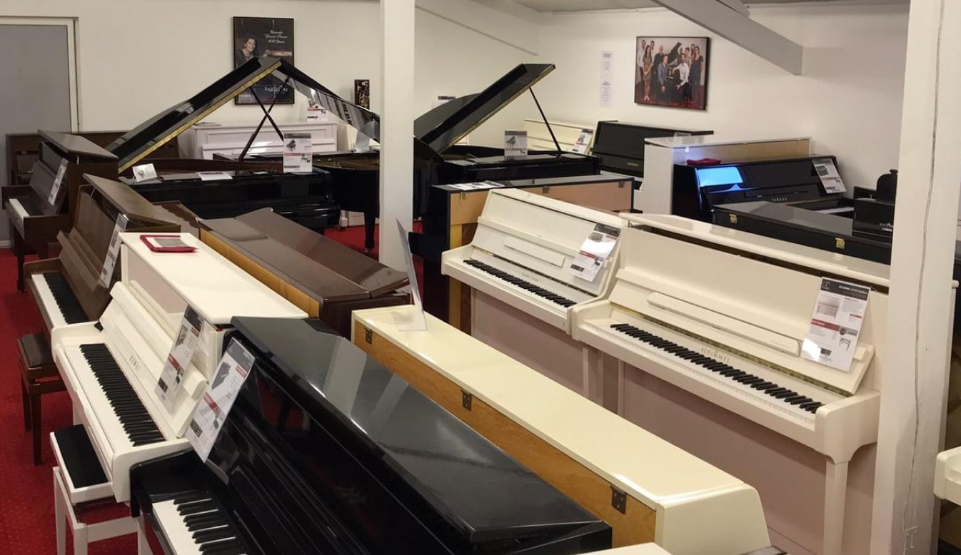 Devanture du magasin Juste un Piano à Versailles Guyancourt